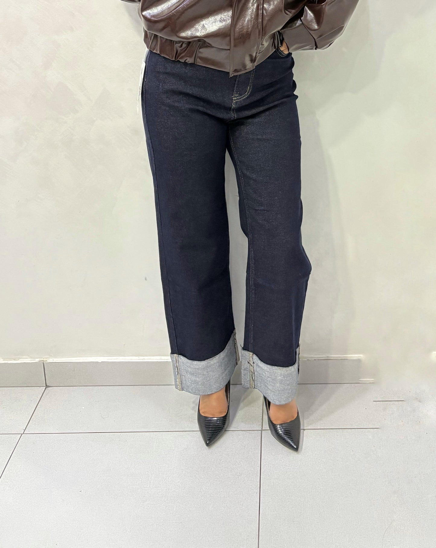 Jeans con piegone